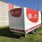 Høj trailerpresenning med print af logo